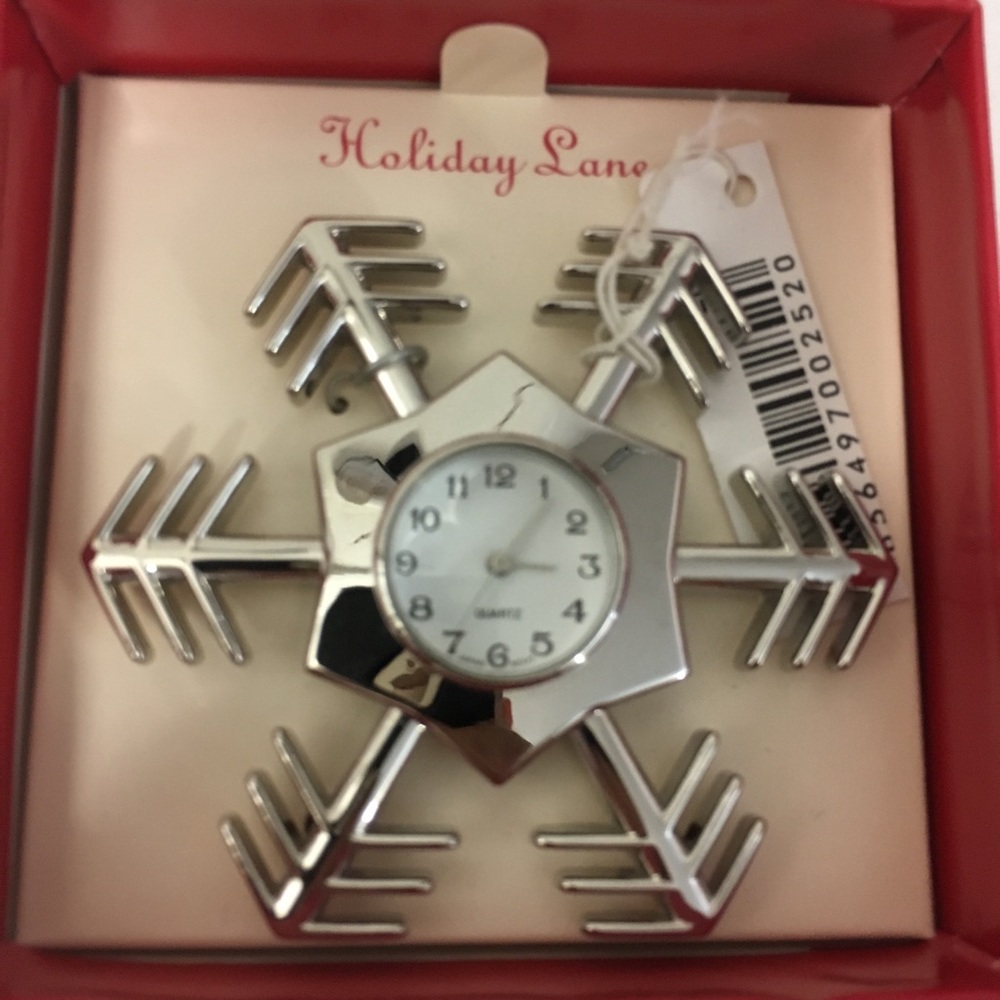Snowflake clock brooch